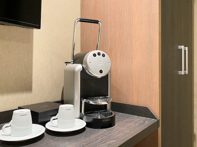 Nespresso machine in every room for free coffee and tea