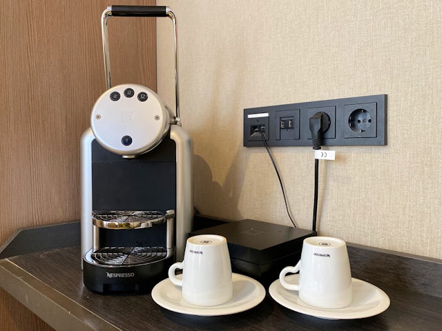 Nespresso machine in every room for free coffee and tea