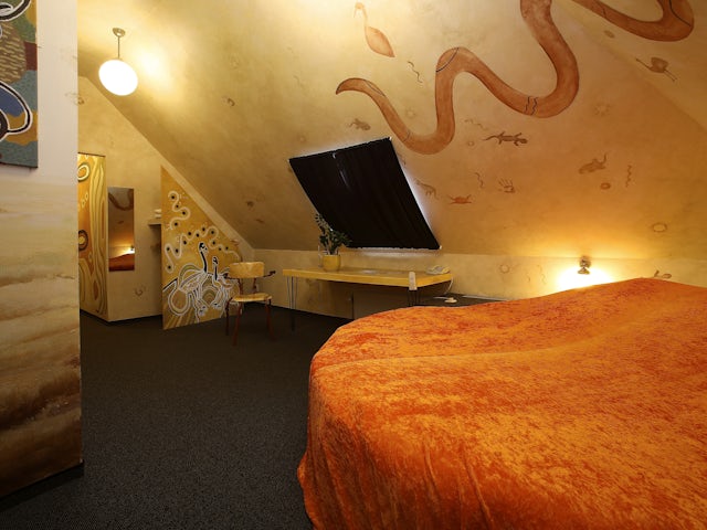 Have you ever wanted to go to Australia? Now is your chance, in our Eucalyptus theme room.